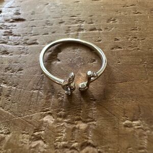 Elegant Silver Ring with Music Symbols